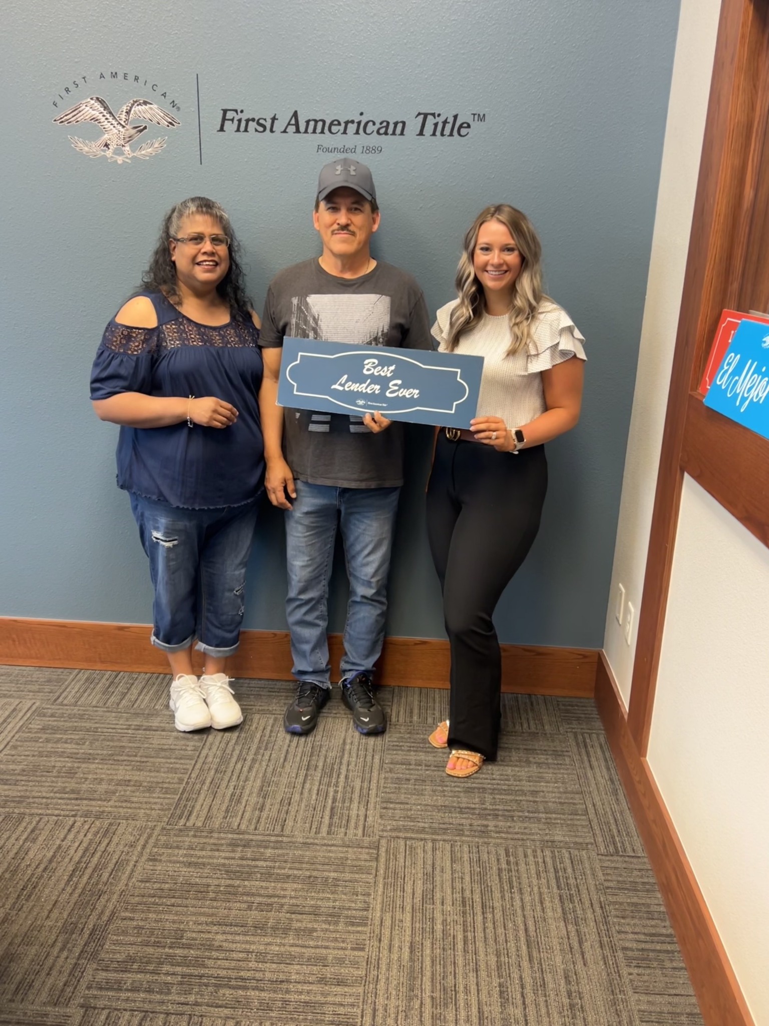A client celebrating closing with her homebuying team